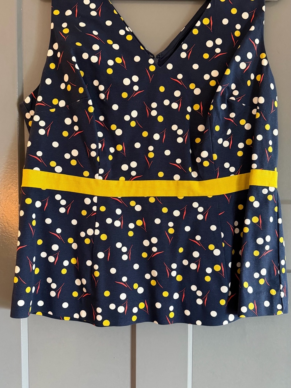 Boden Navy Polka Dot Peplum Blouse with Yellow, White and Red Accents